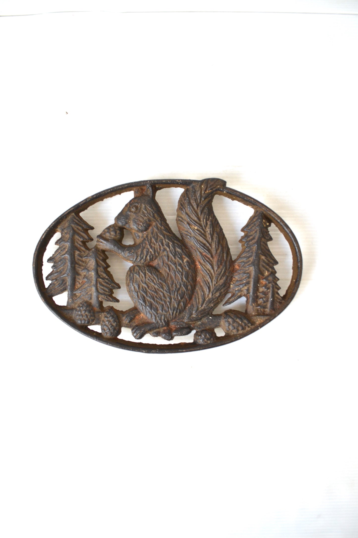 Dessous de plat en fonte
