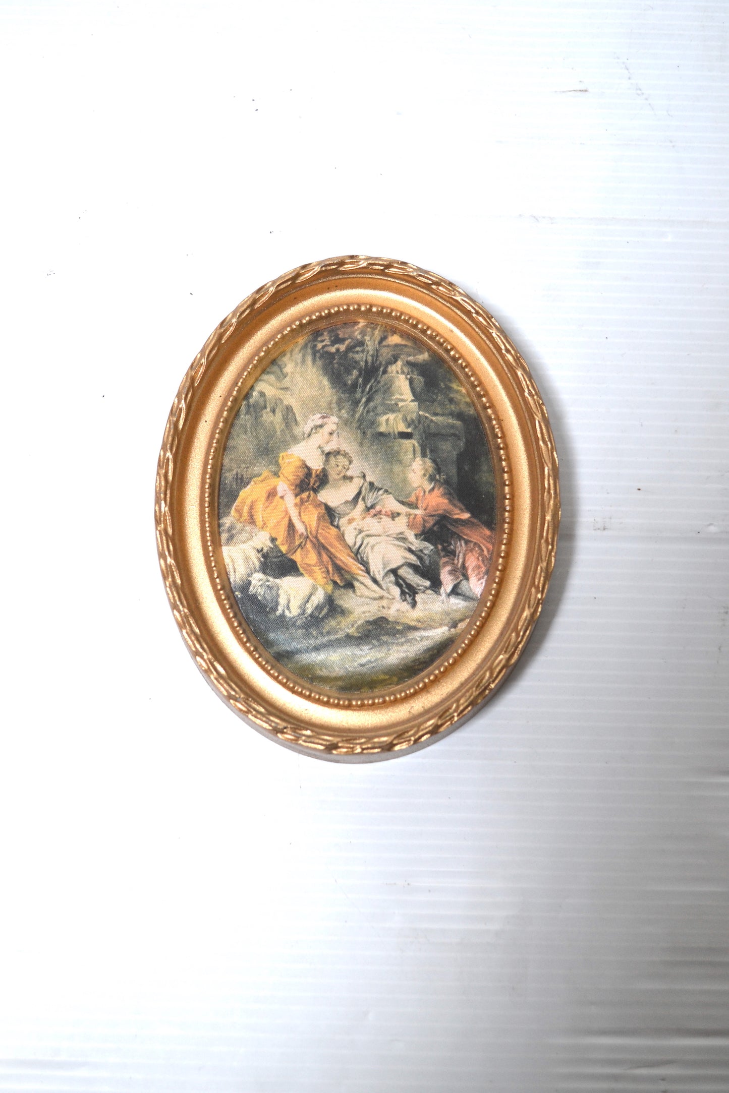 Cadre oval doré