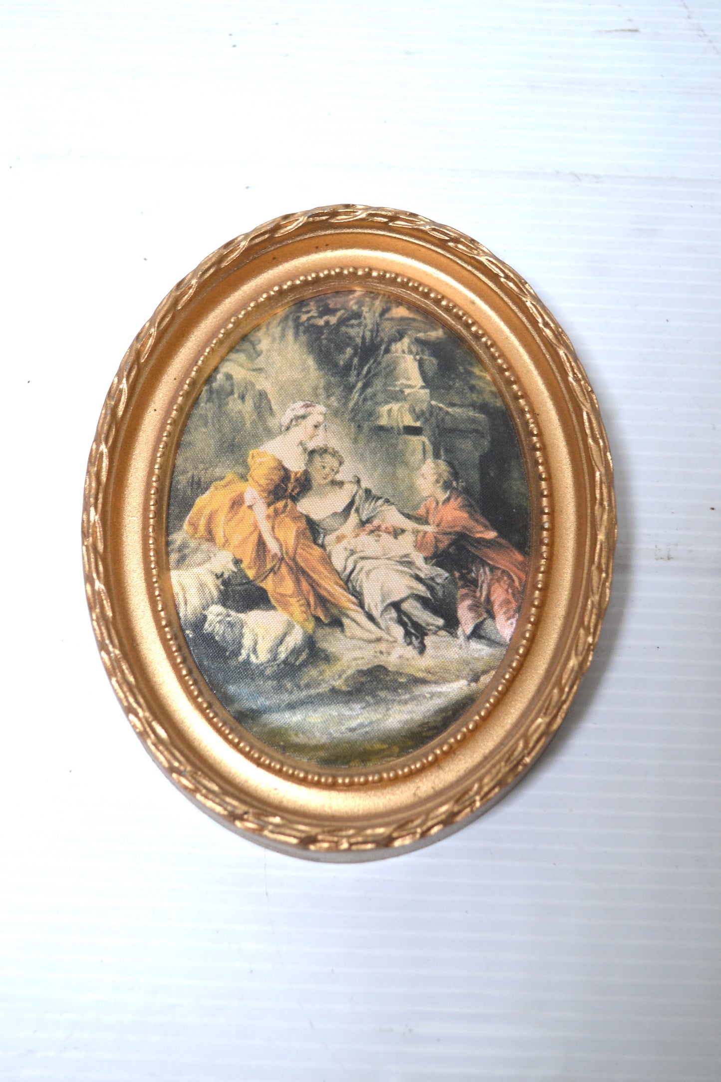 Cadre oval doré