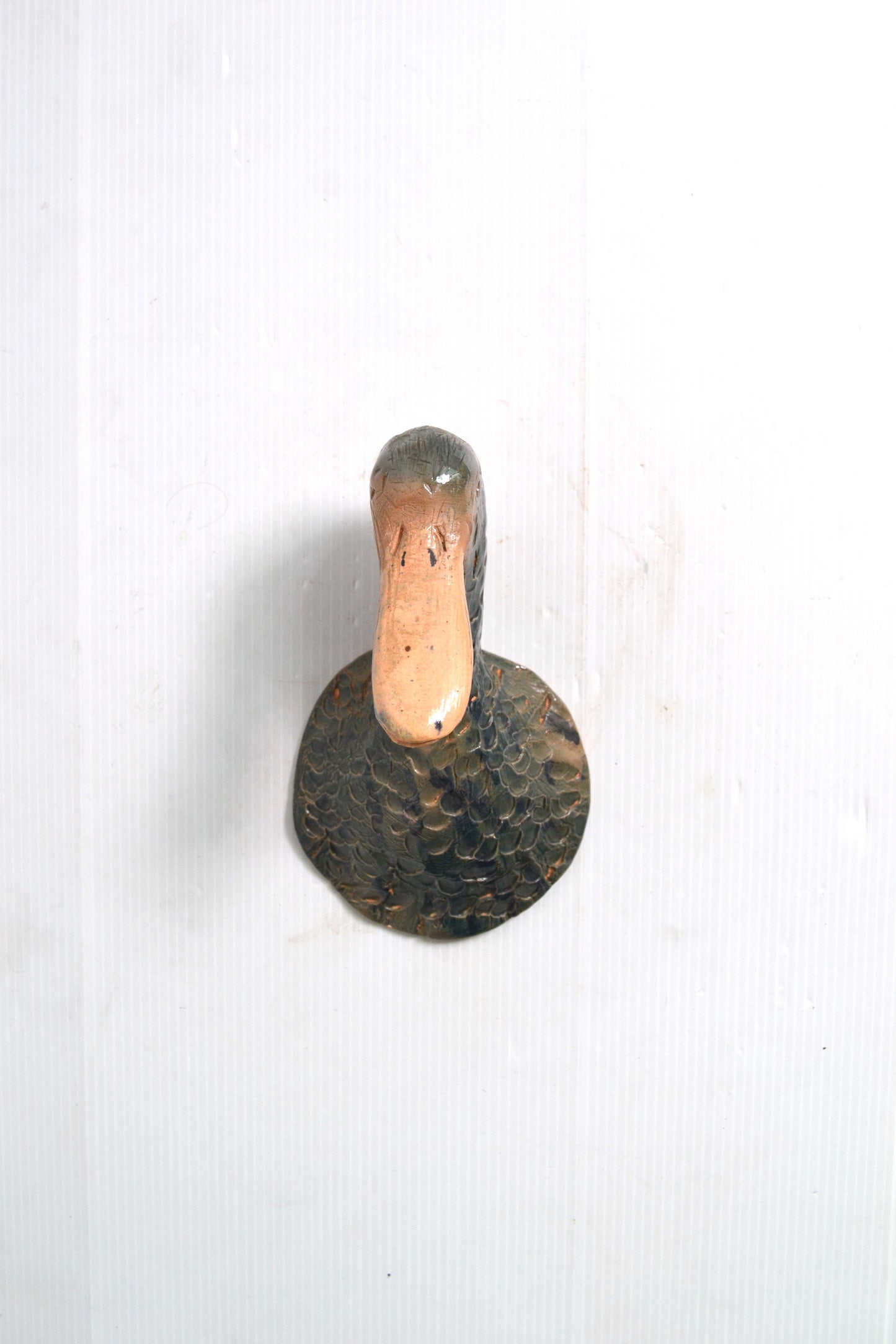 Applique tête de canard en céramique