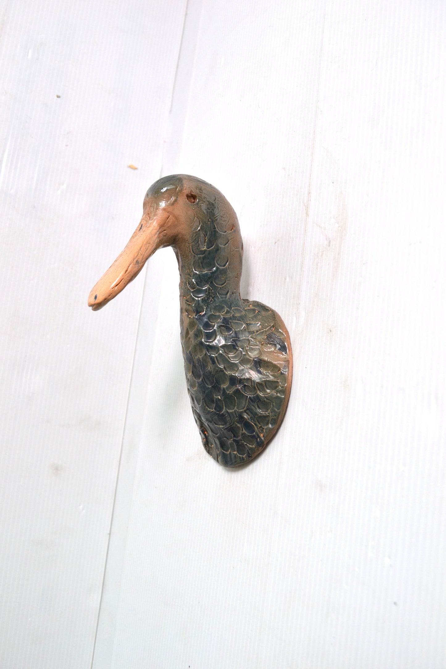 Applique tête de canard en céramique