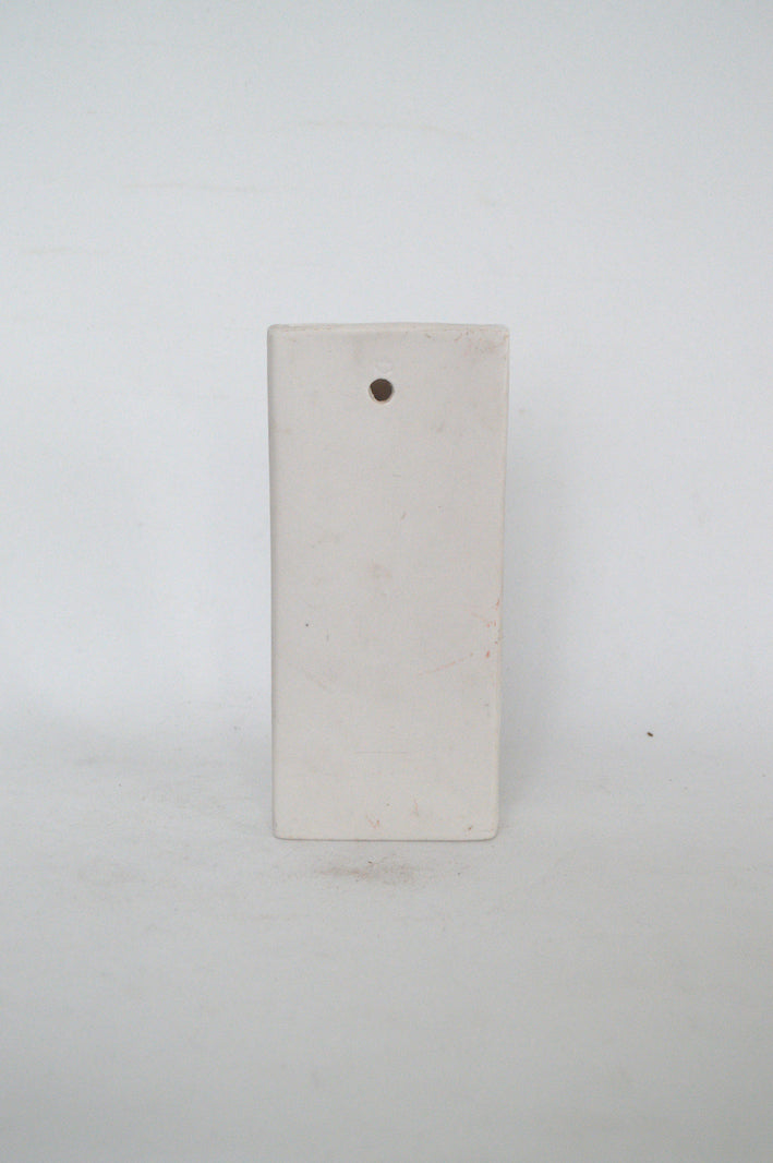 Vase mural en forme de maison