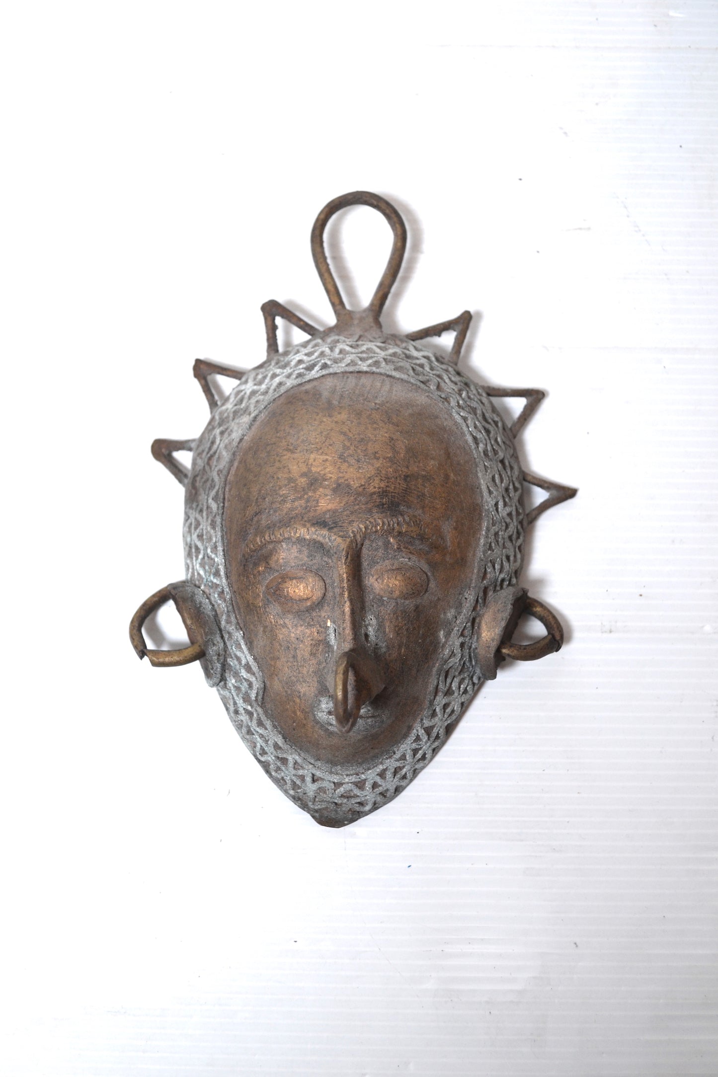 Masque en bronze