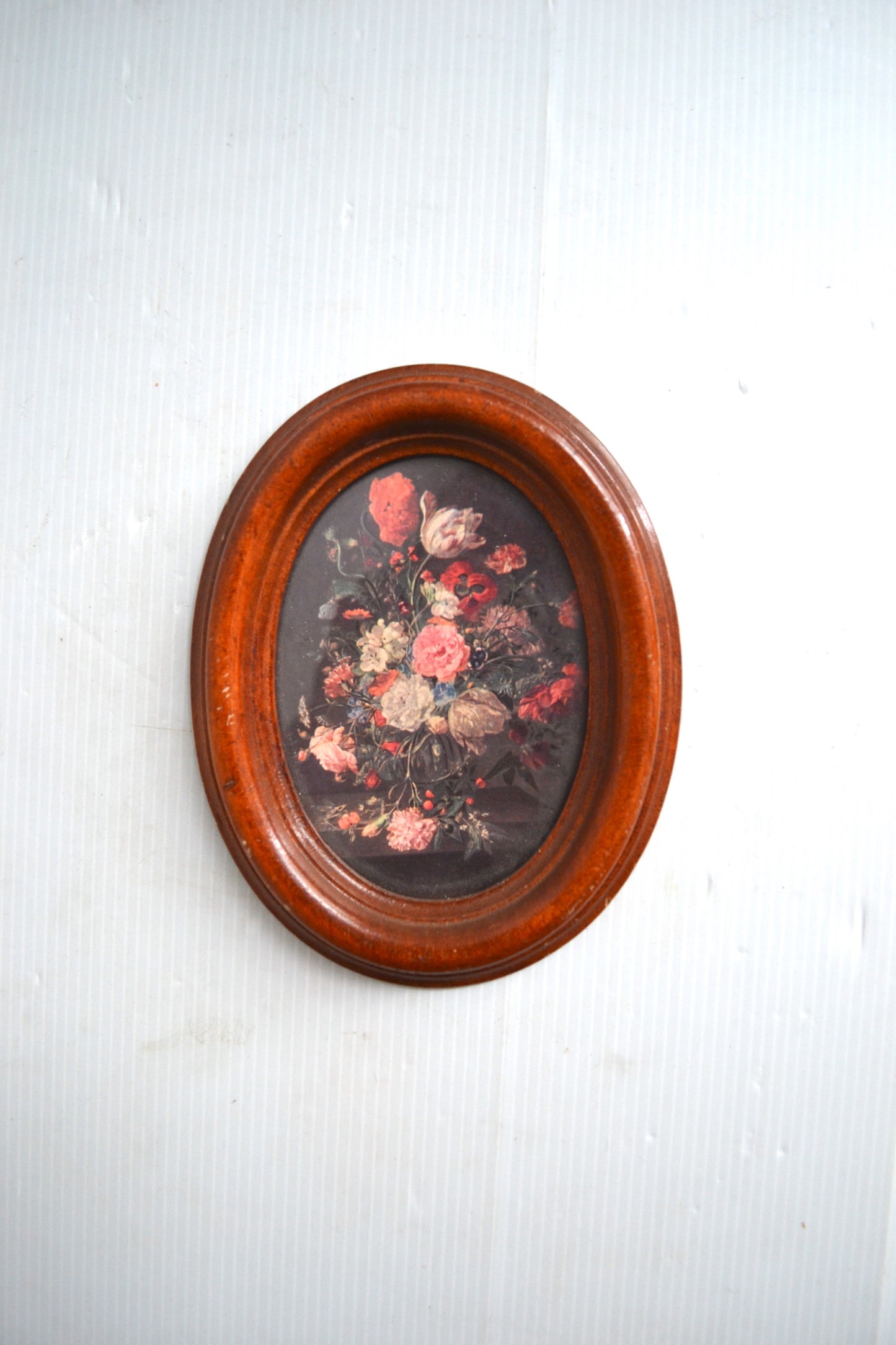 Petit cadre oval fleuri