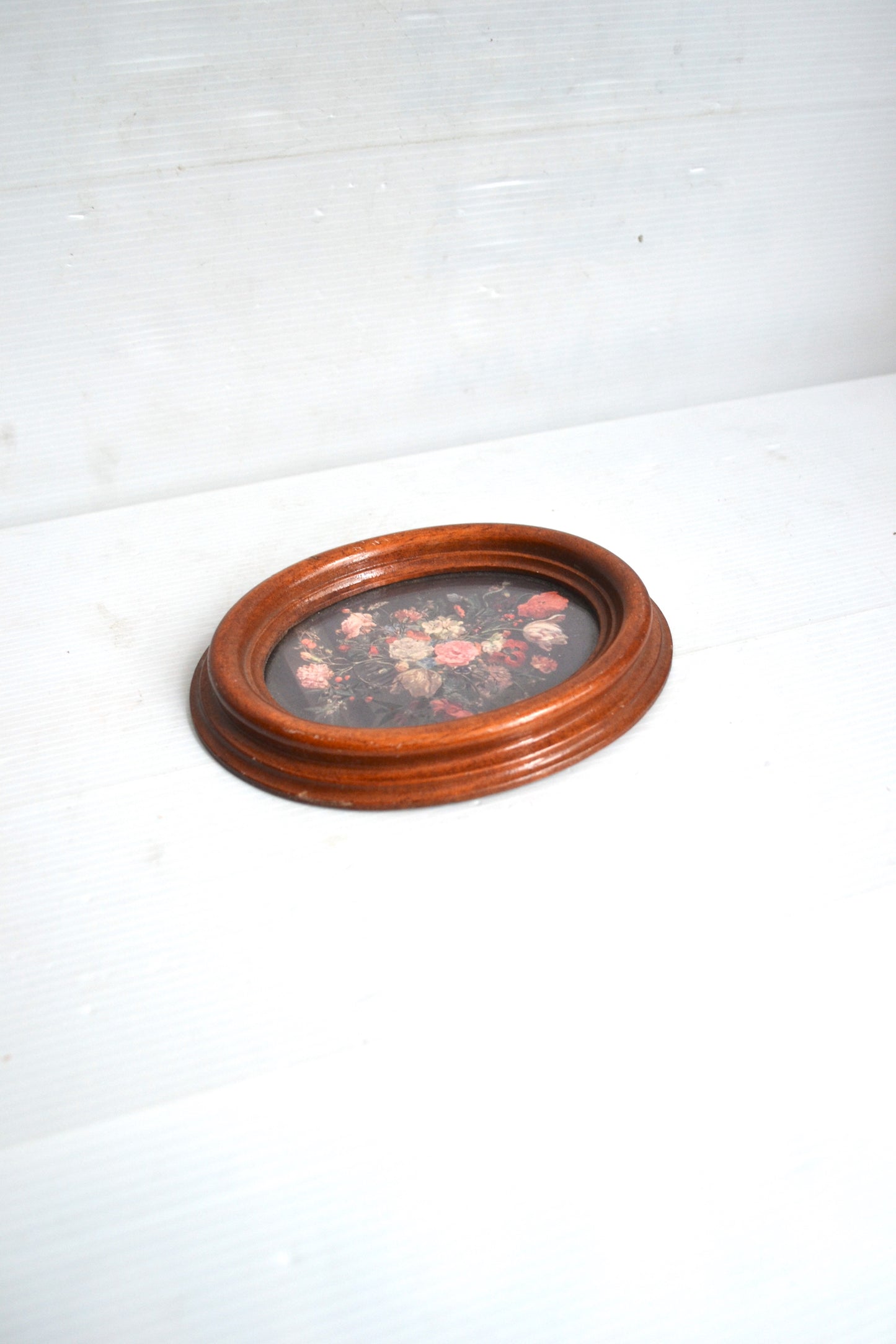 Petit cadre oval fleuri