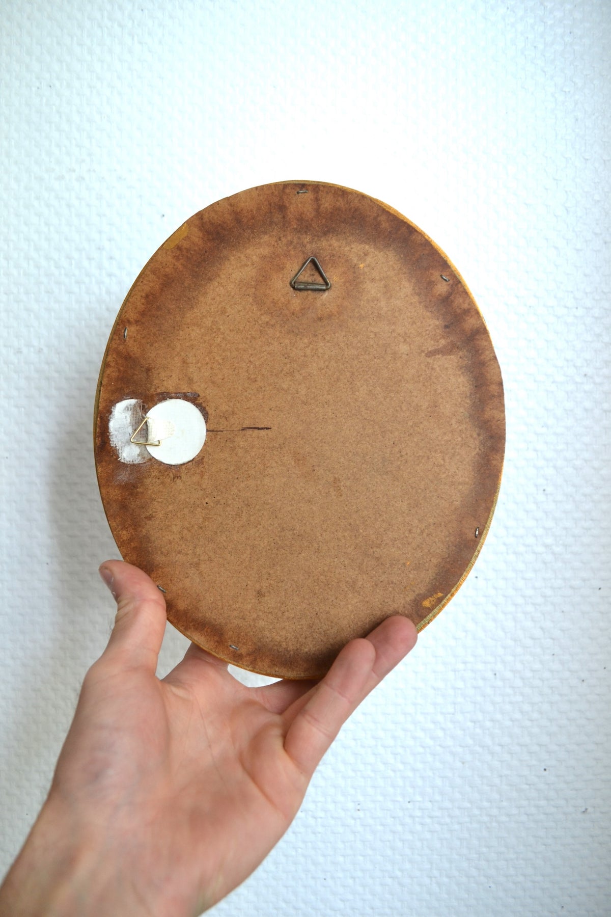 Petit miroir ovale doré