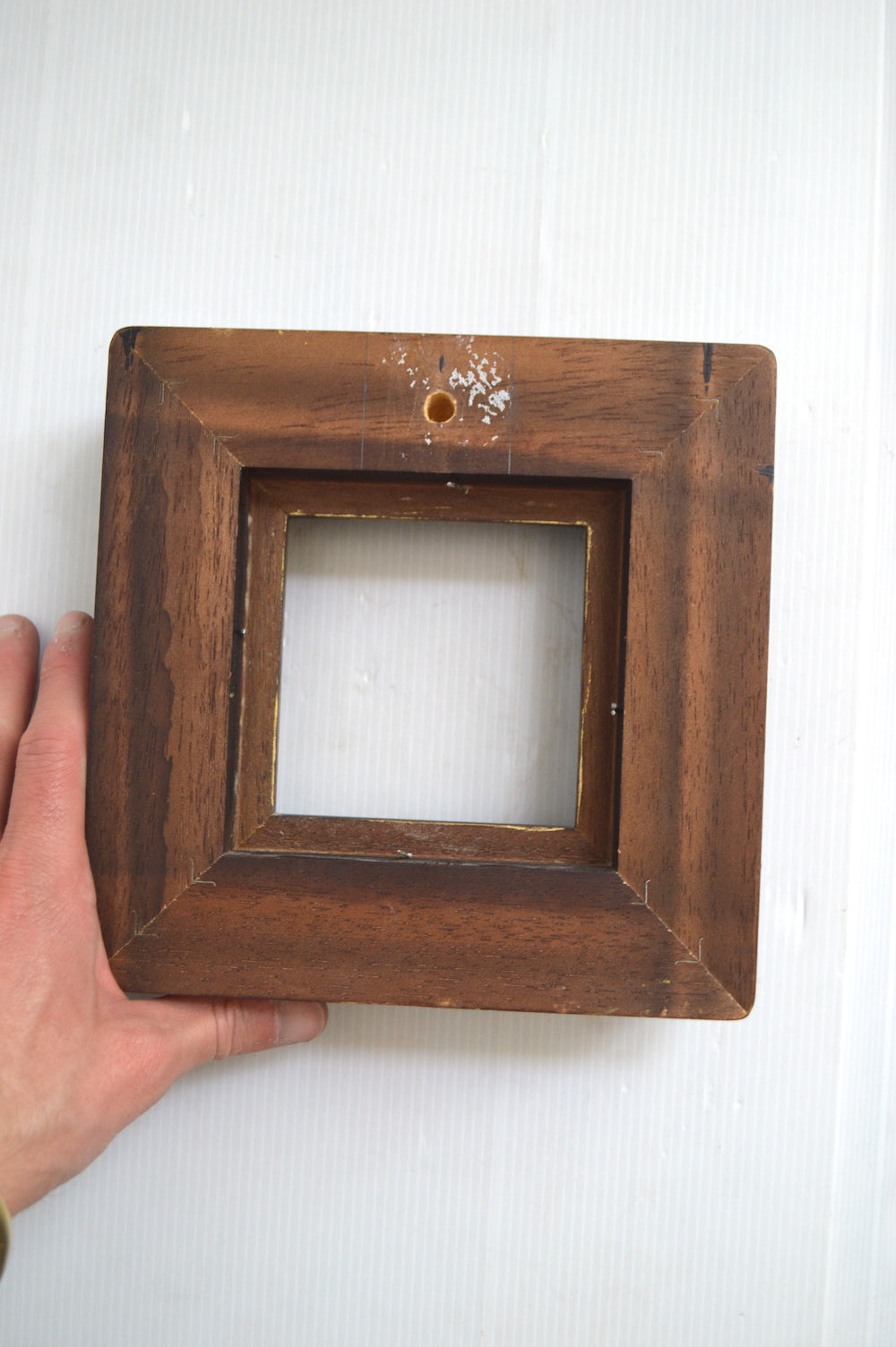 Cadre en bois noir et doré