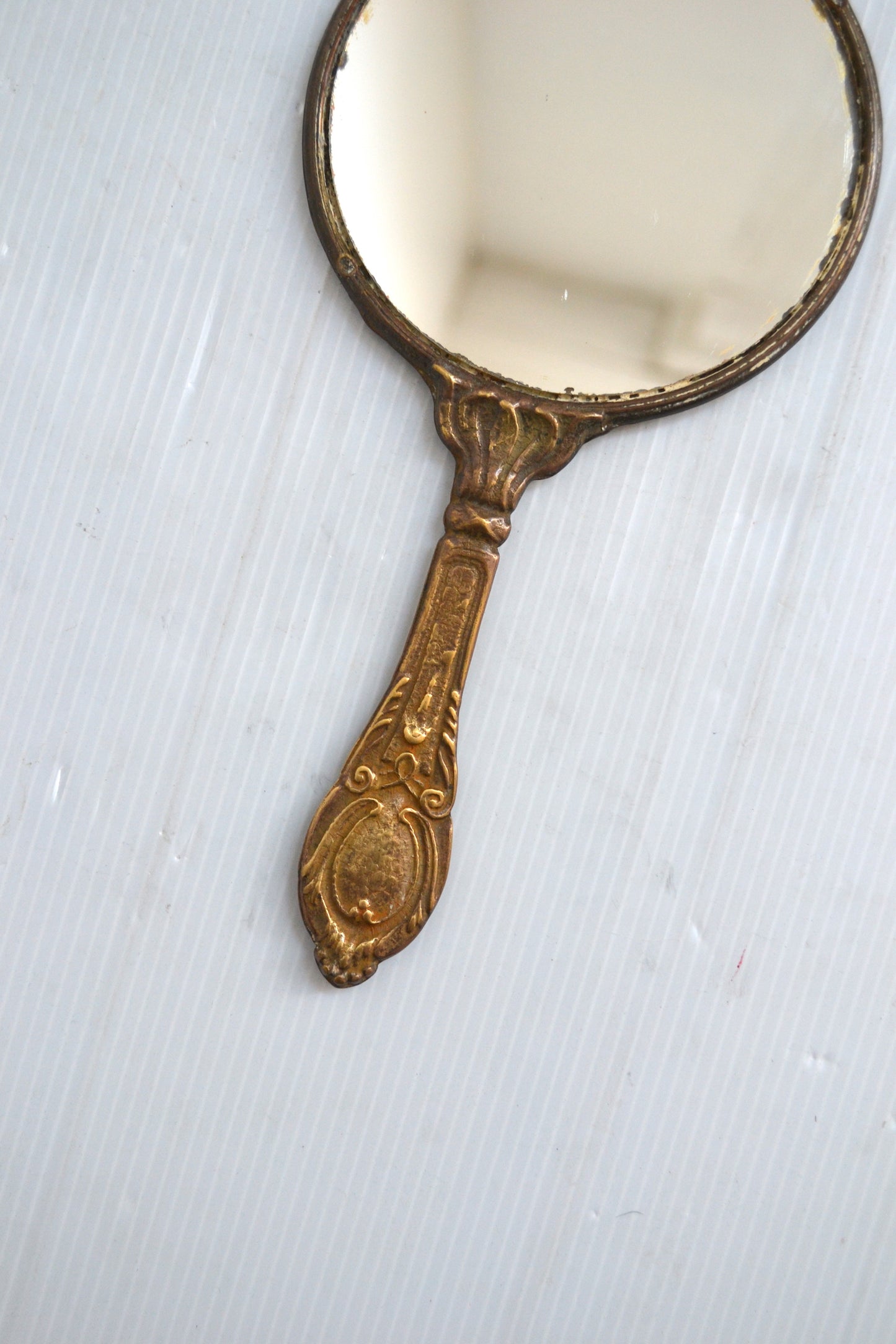 Miroir à main en bronze