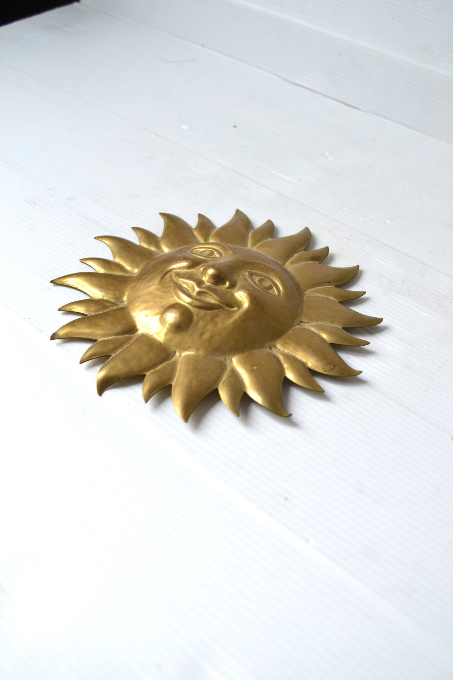 Soleil en laiton