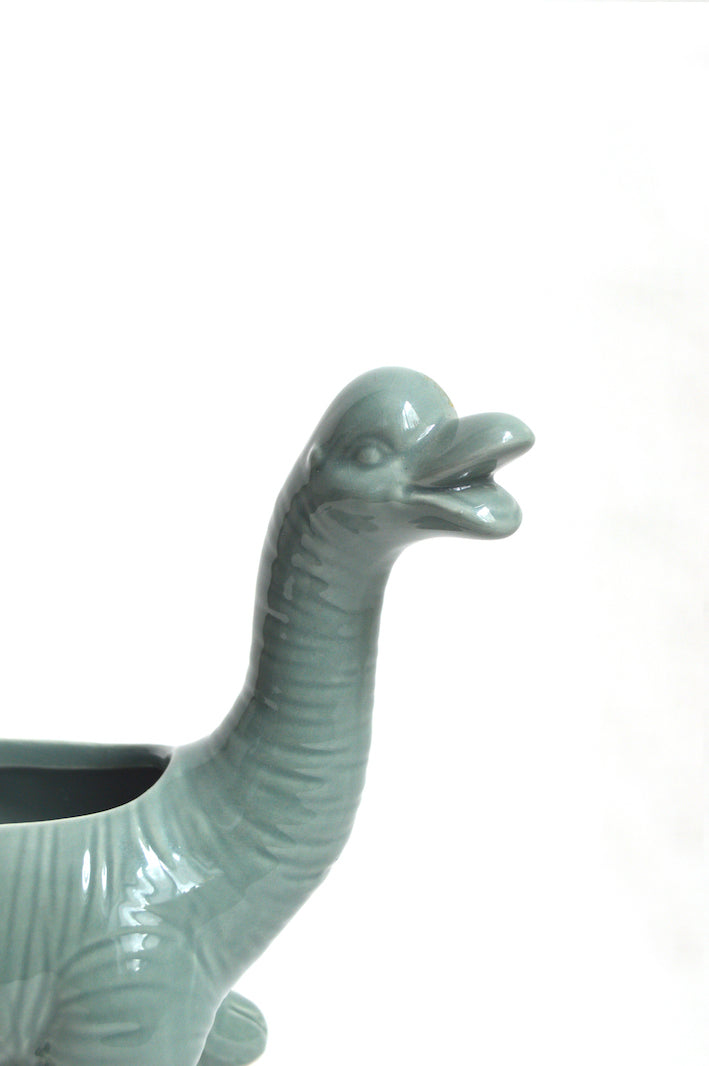 cache-pot en forme de dino