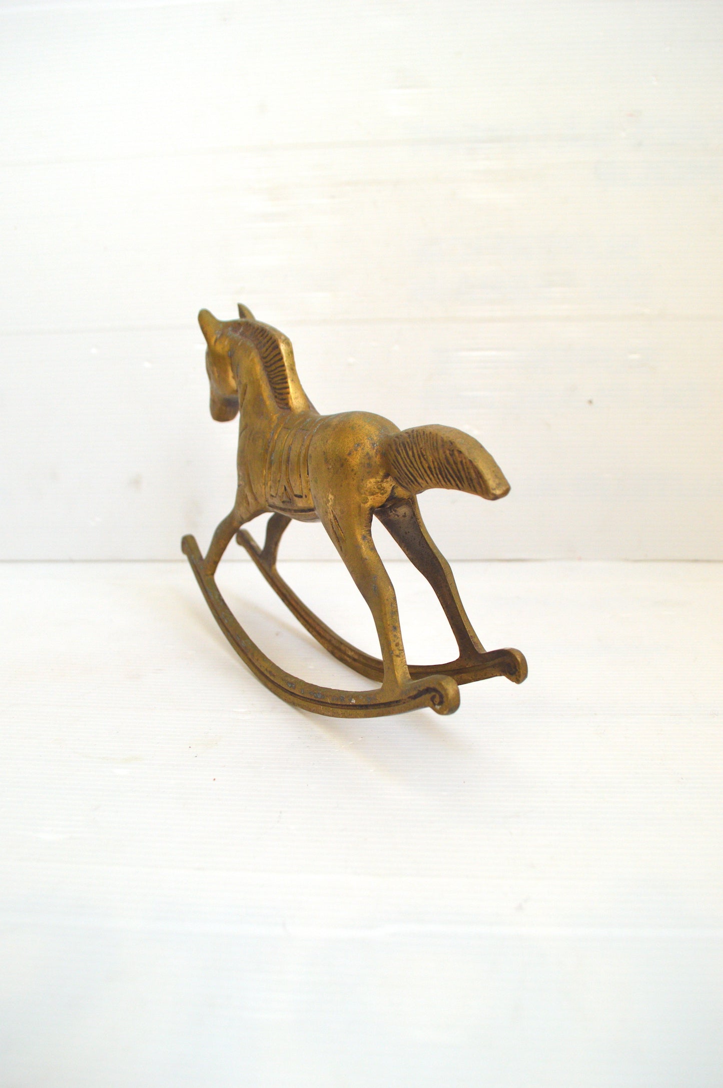 cheval-à-bascule-en-laiton