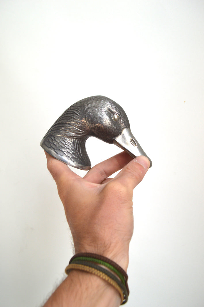 ancien décapsuleur en forme de tete de canard