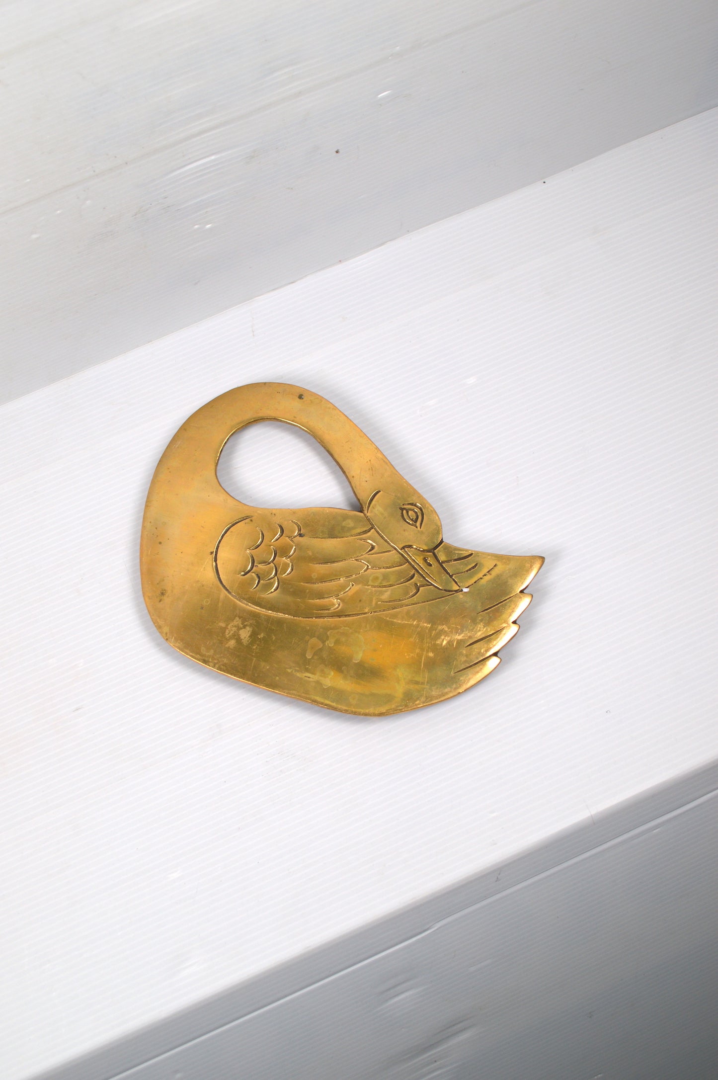 dessous-de-plat-oiseau-en-laiton