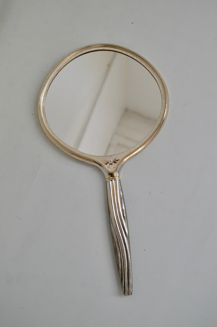 miroir à main argenté