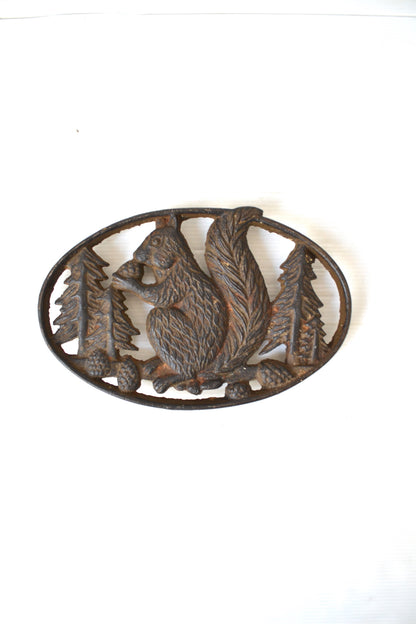 Dessous de plat en fonte