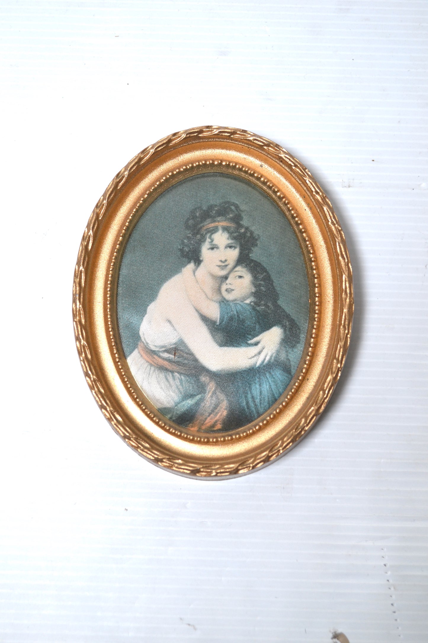 Cadre oval doré