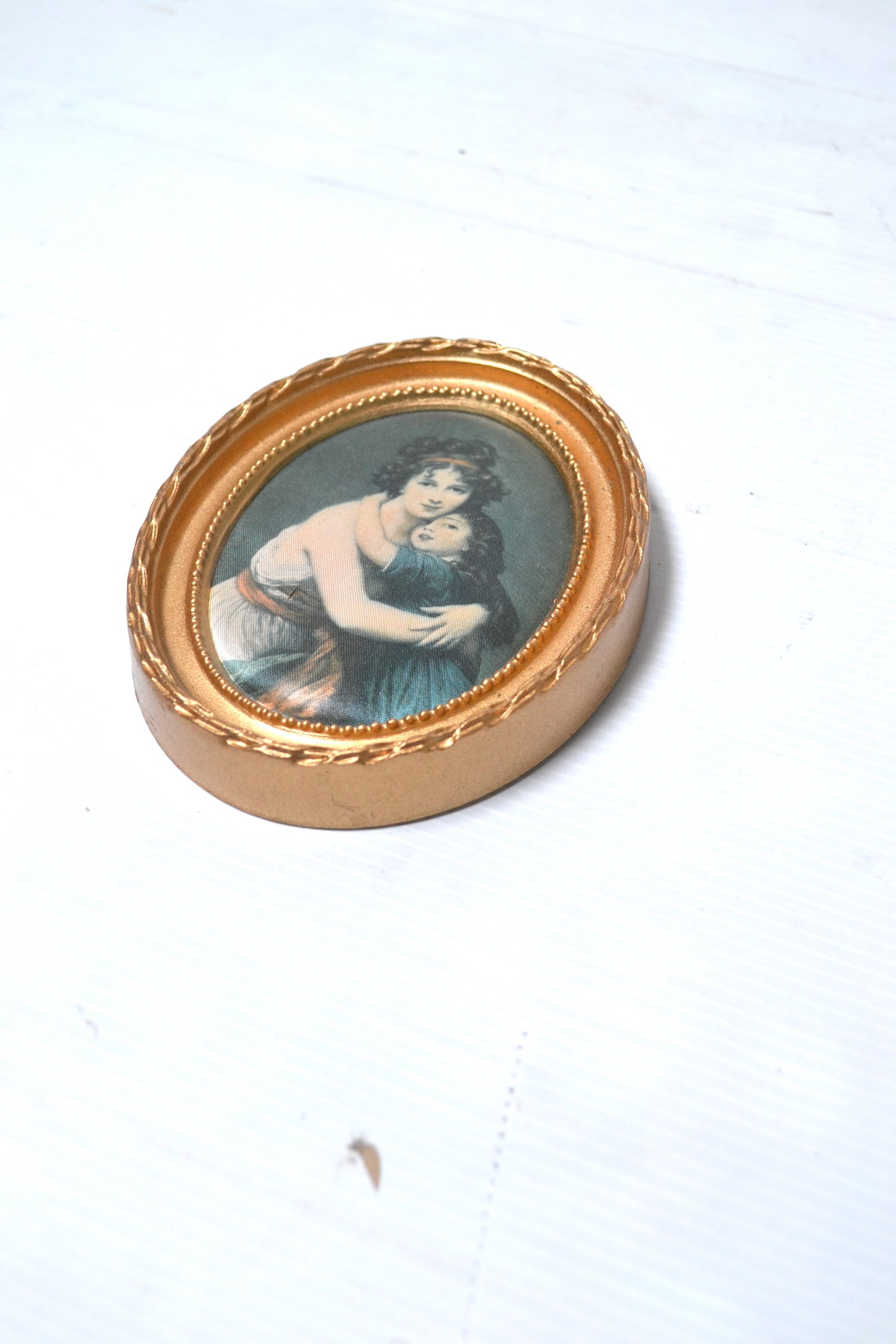 Cadre oval doré
