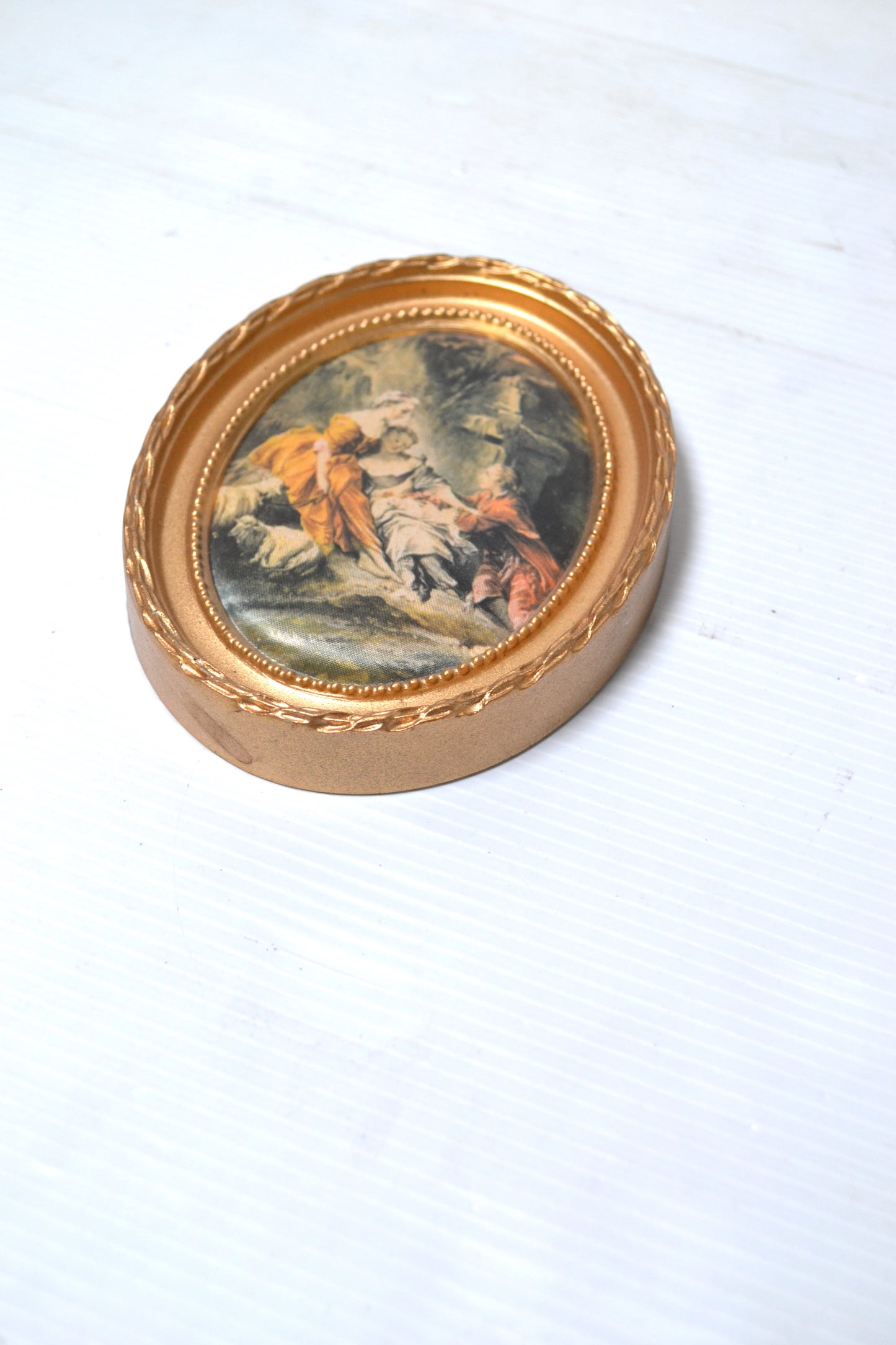 Cadre oval doré