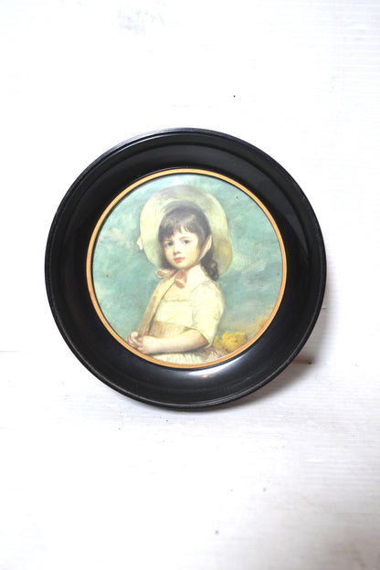 Cadre circulaire noir et doré