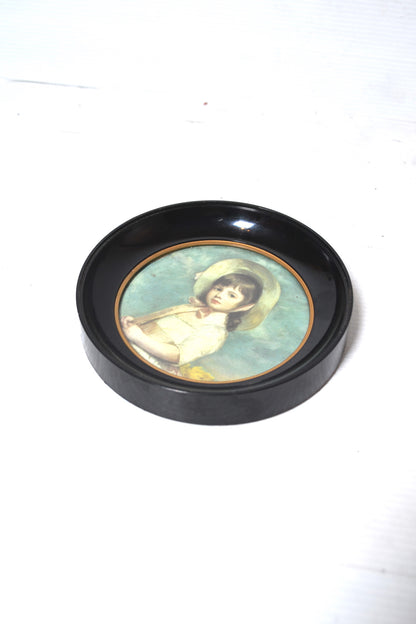 Cadre circulaire noir et doré