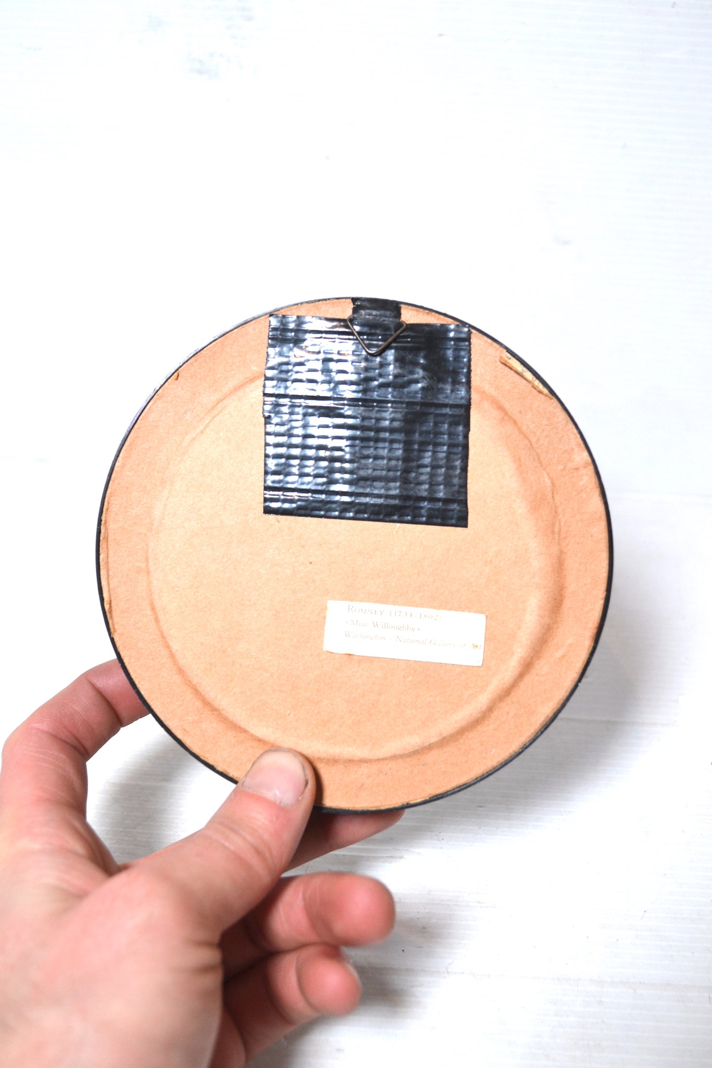 Cadre circulaire noir et doré