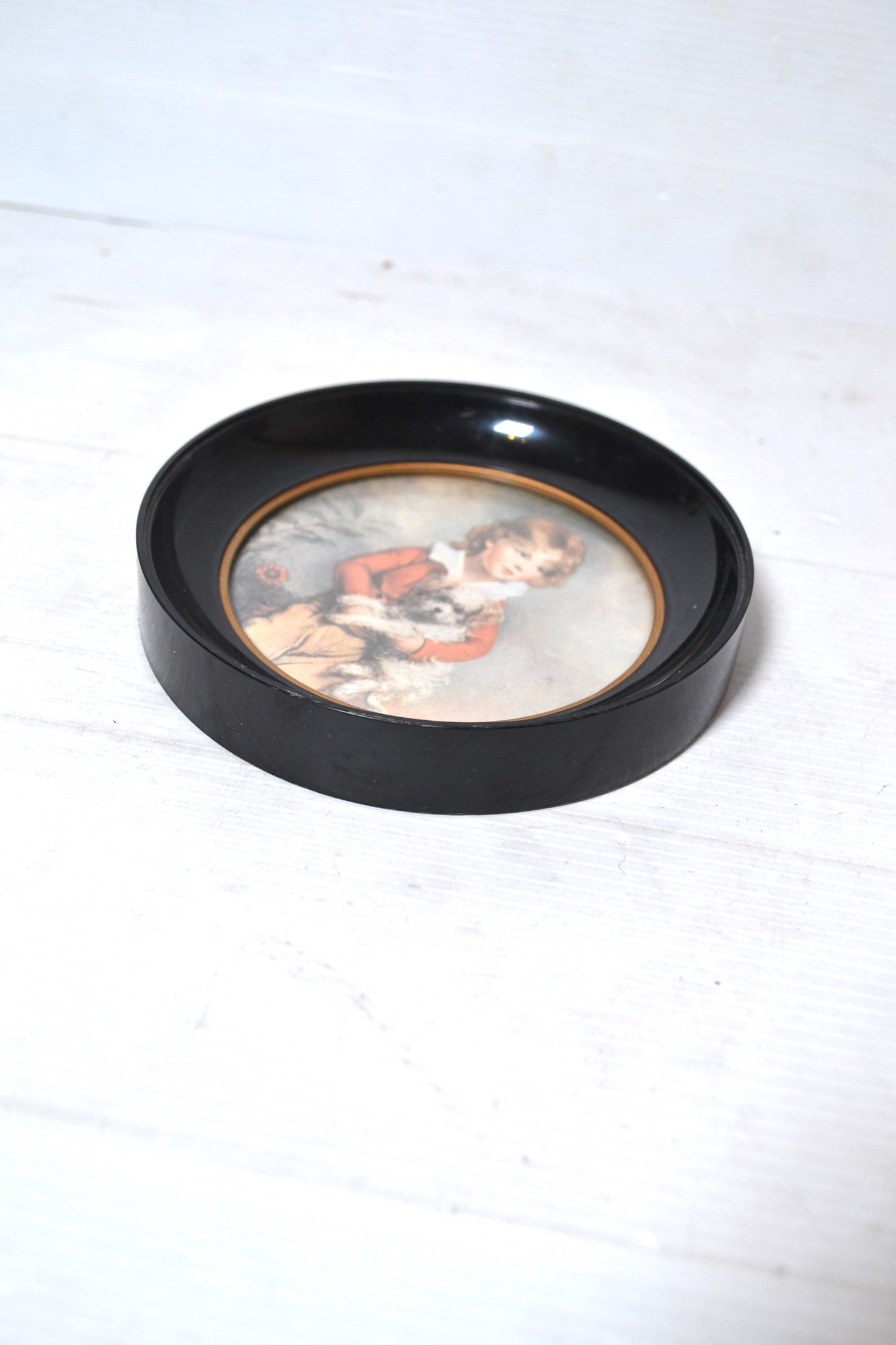 Cadre circulaire noir et doré