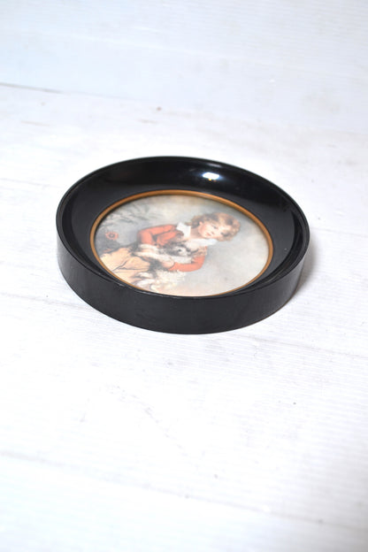 Cadre circulaire noir et doré