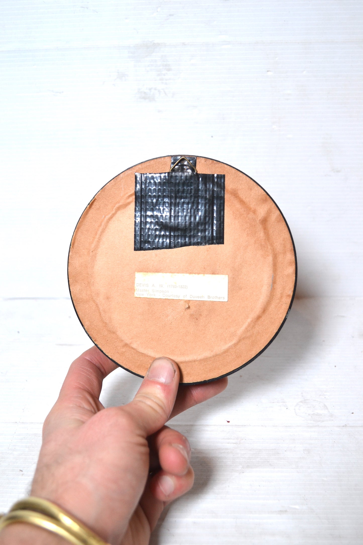 Cadre circulaire noir et doré