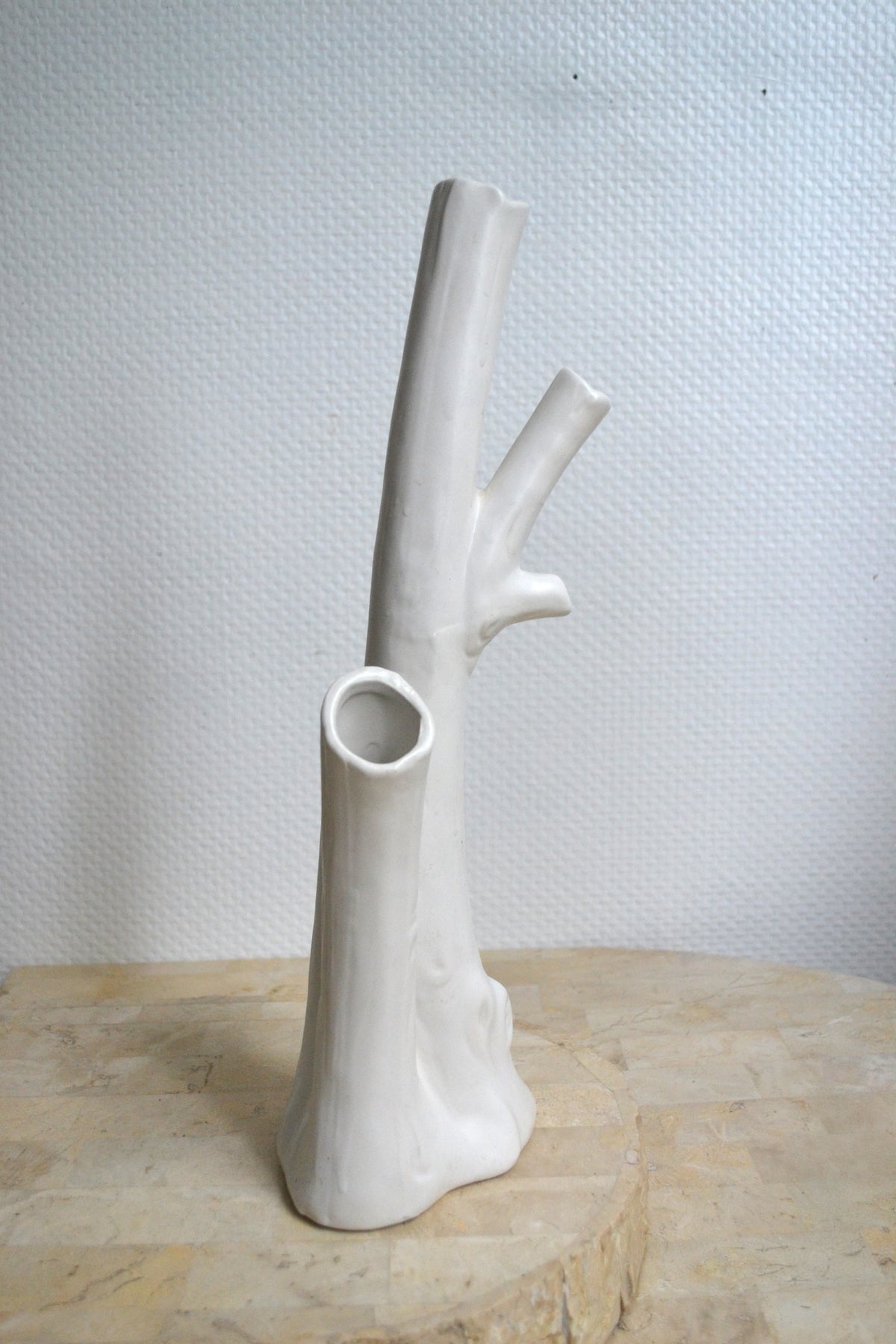 Vase à trous