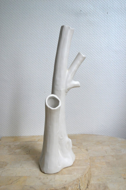 Vase à trous