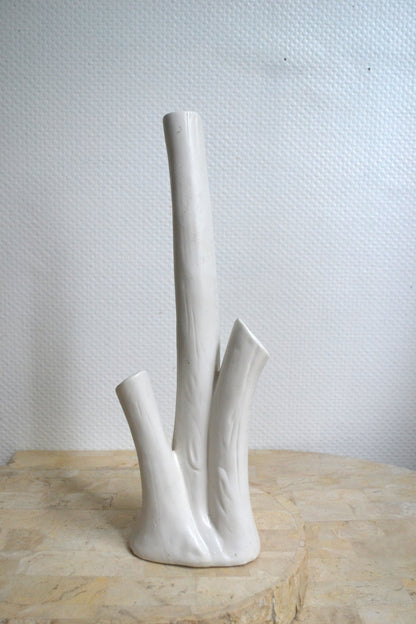 Vase à trous
