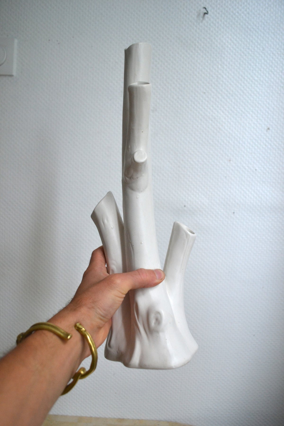 Vase à trous