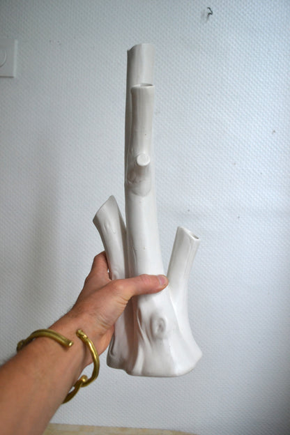 Vase à trous