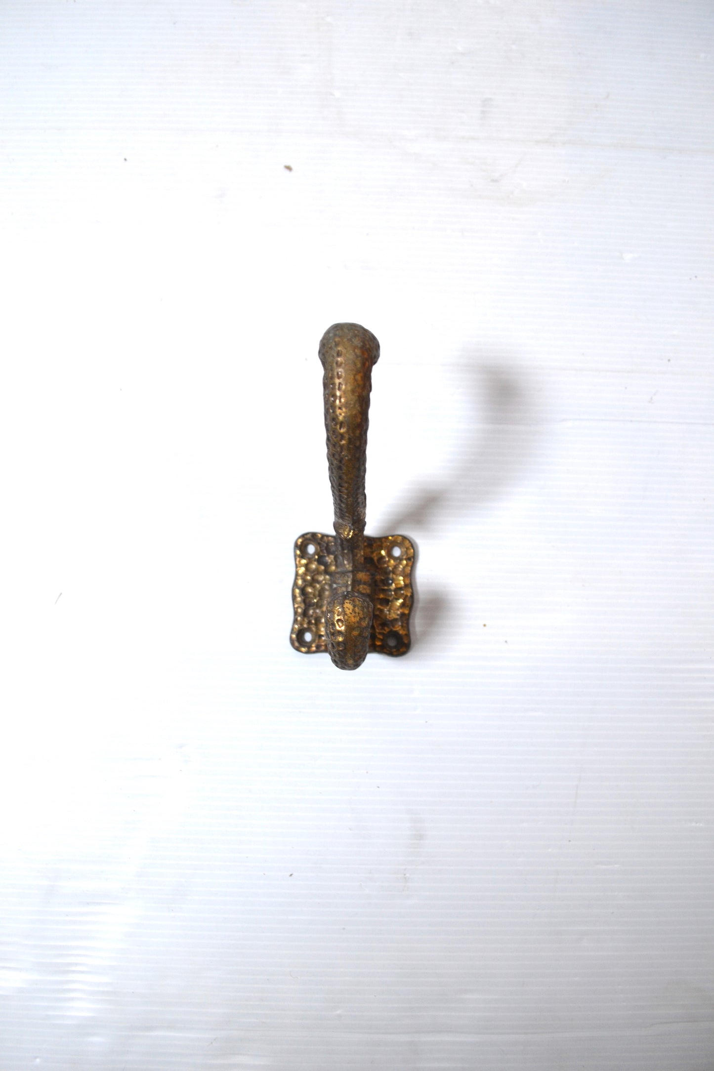 Ancienne patère dorée