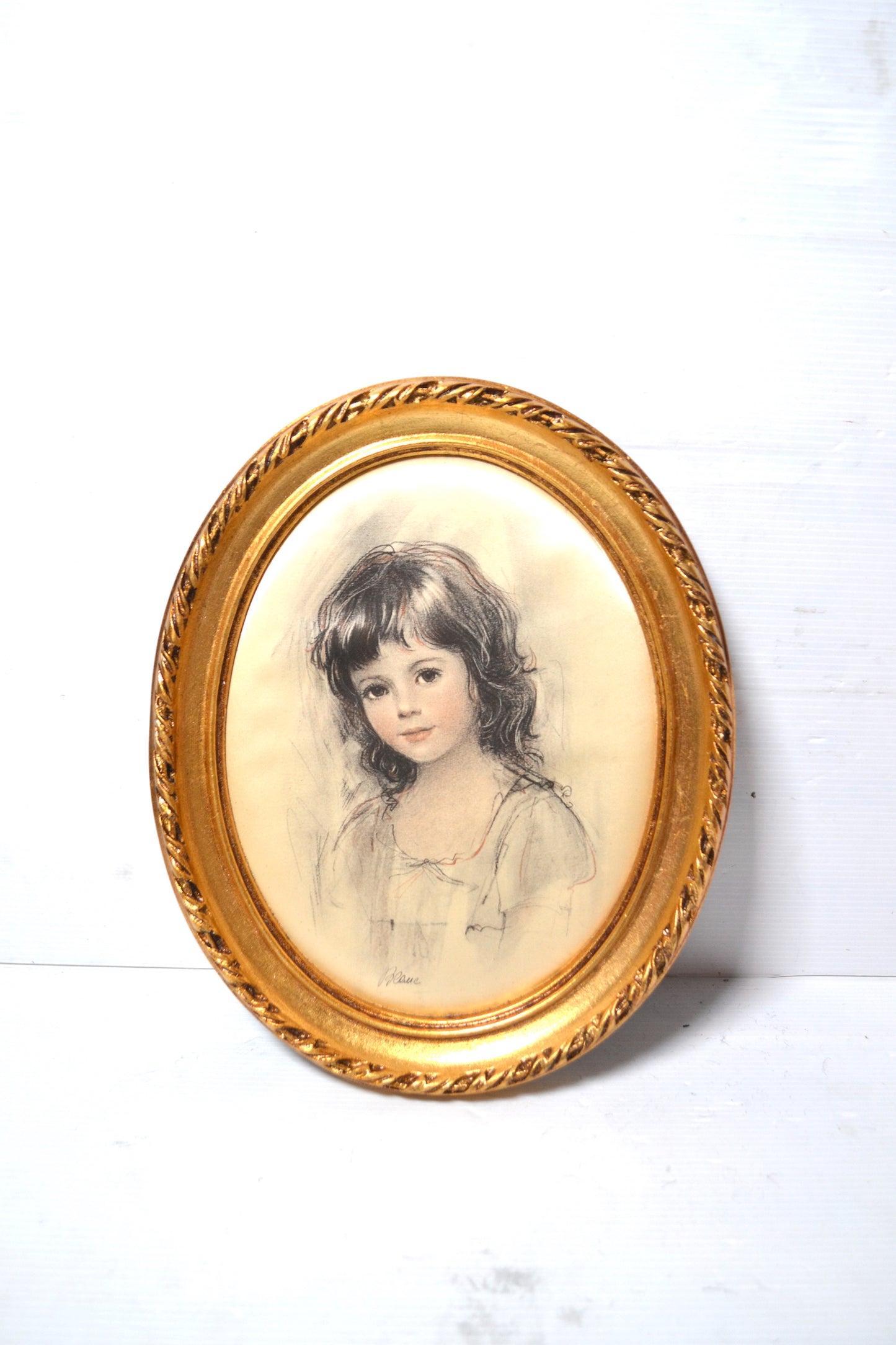 Cadre oval doré