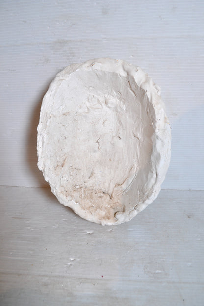 Visage en plâtre à suspendre