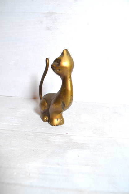 Chat en laiton