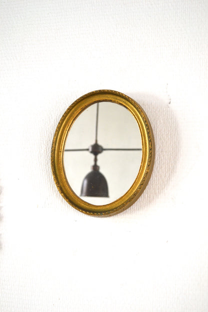 Miroir ovale doré