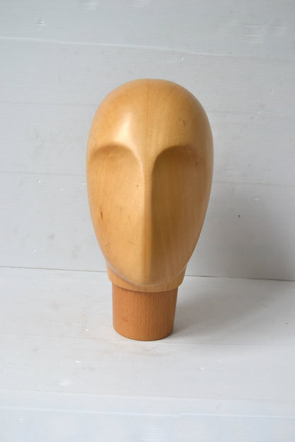 Tête à chapeau
