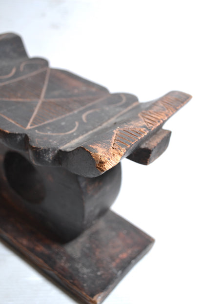 Repose-tête africain en bois