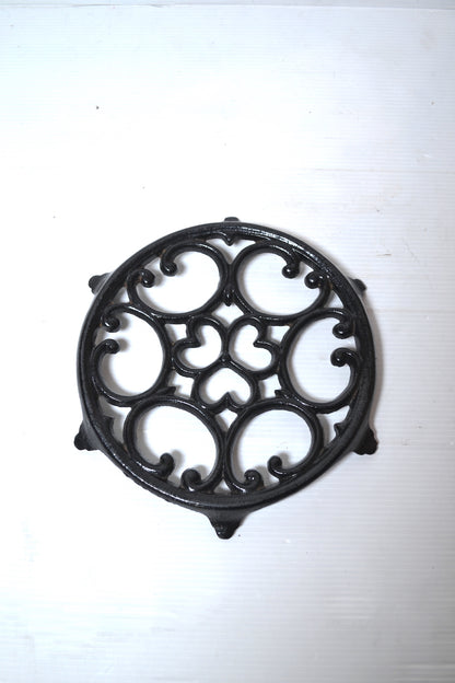 Dessous de plat en fonte