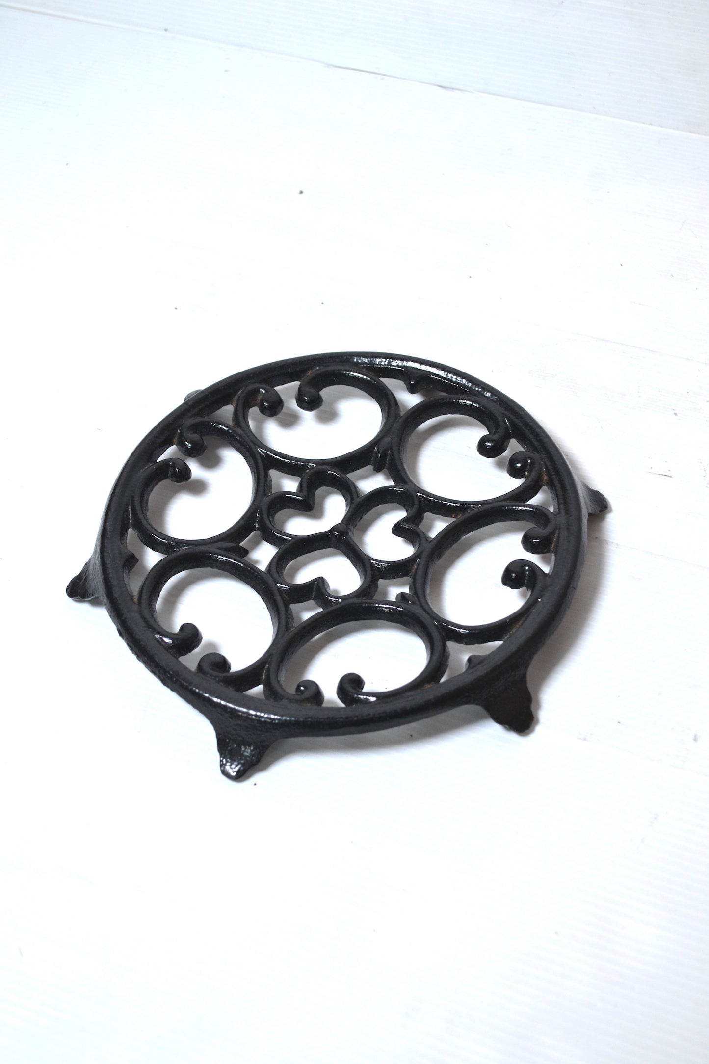 Dessous de plat en fonte