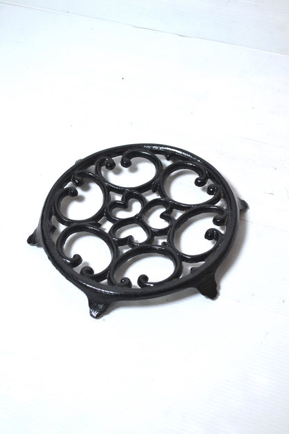 Dessous de plat en fonte