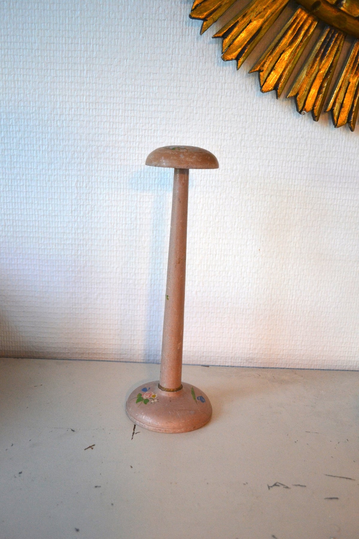 Tête à chapeau