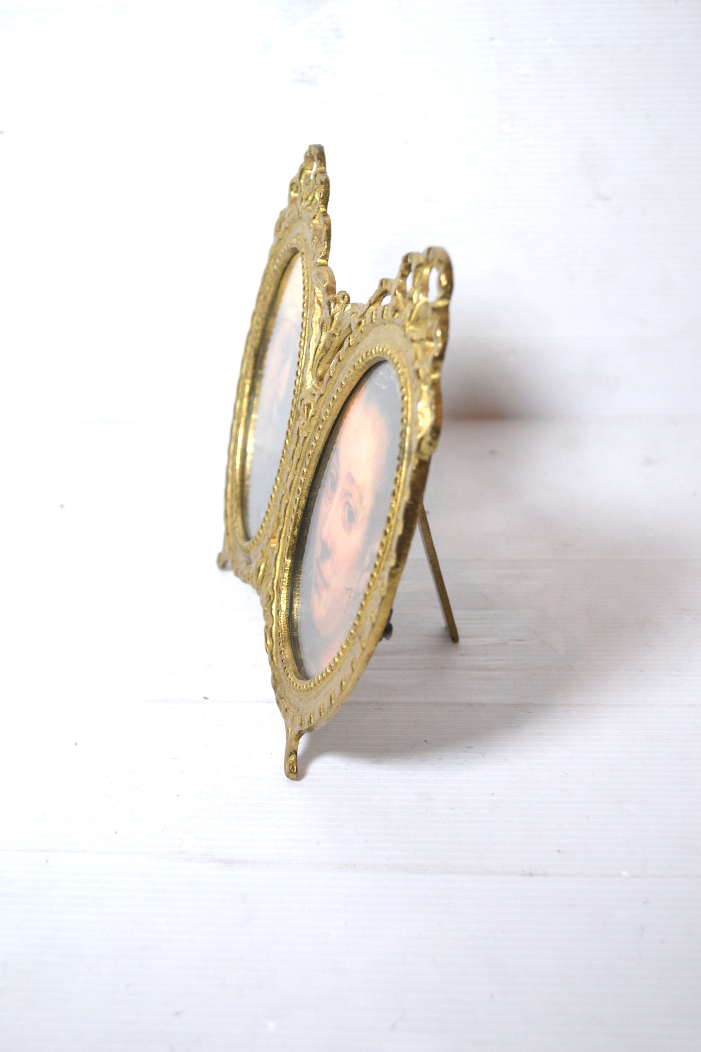 Ancien cadre double doré en laiton à poser