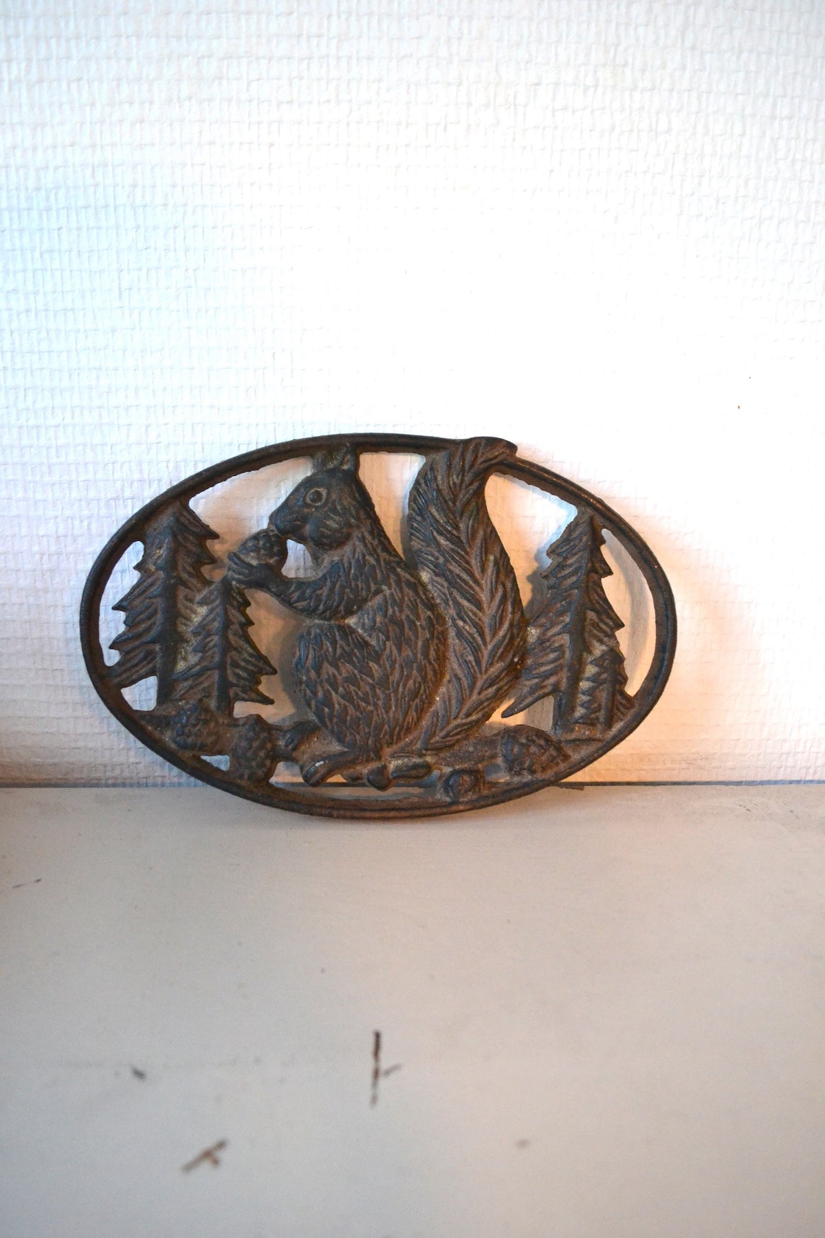 Dessous de plat en fonte