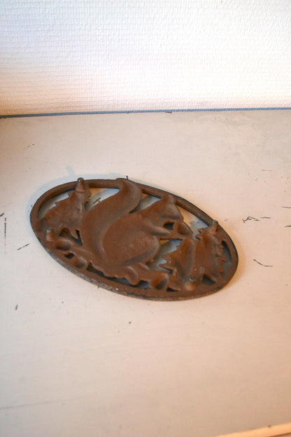 Dessous de plat en fonte