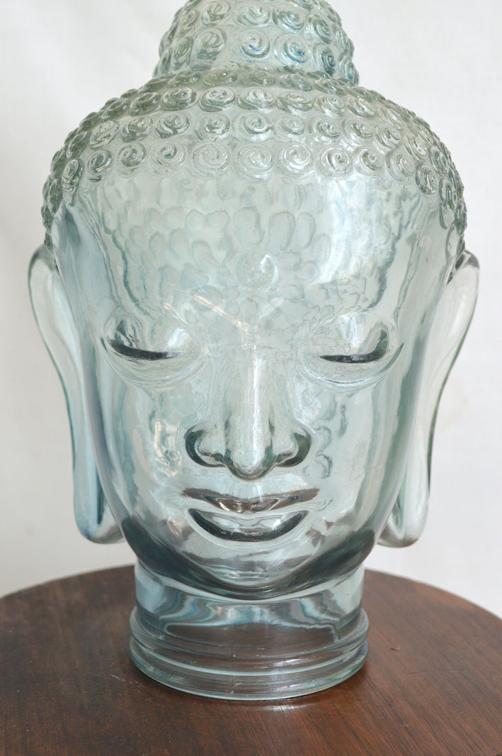 ancienne tête de bouddha en verre