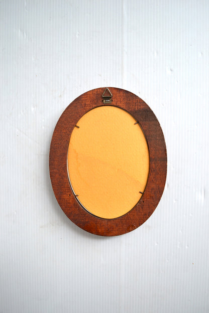 Petit cadre oval fleuri