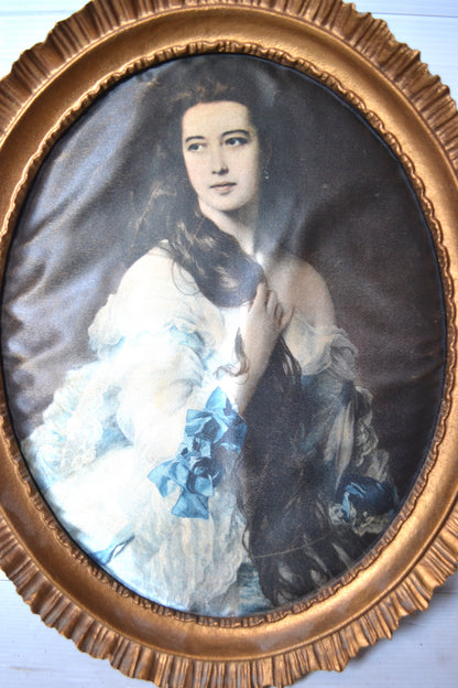 Cadre médaillon doré